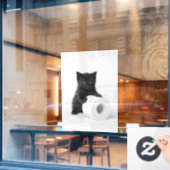 Curious Black Kitten Guarding Toilet Paper Roll On ウィンドウサイン (カフェ窓)