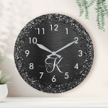 Custom Black Glitter Sparkle Monogram ラージ壁時計<br><div class="desc">Easily personalize this trendy elegant clock design featuring pretty black sparkling glitter on a black brushed metallic background.</div>