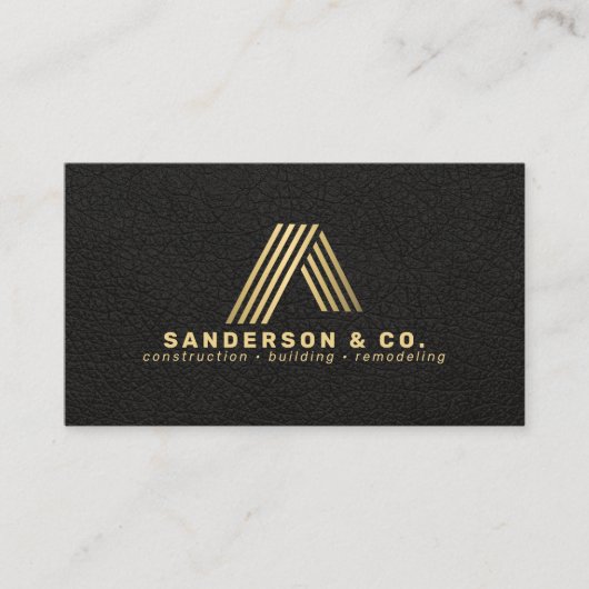 Custom black gold logo building construction 名刺 (正面)