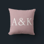 Custom Initials on Dusty Rose Mauve クッション<br><div class="desc">This custom throw pillow features a clean,  modern,  and elegant design. Sample initials are printed in the center in a sophisticated white font. The background is a solid dusty rose or mauve color. You can personalize the pillow to include your own custom initials or other text of your choice.</div>
