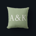 Custom Initials on Sage Green Wedding クッション<br><div class="desc">This custom throw pillow features a clean,  modern,  and elegant design. Sample initials are printed in the center in a sophisticated white font. The background is a luxurious sage green color. You can personalize the pillow to include your own custom initials or other text of your choice.</div>