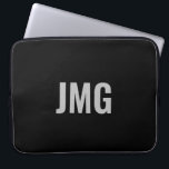 Custom Monogram Black and Silver Laptop Sleeve ラップトップスリーブ<br><div class="desc">You can personalize the silver monogram that's in the center of this black laptop sleeve.</div>