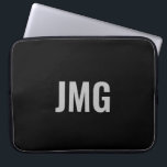 Custom Monogram Black and Silver Laptop Sleeve ラップトップスリーブ<br><div class="desc">You can personalize the silver monogram that's in the center of this black laptop sleeve.</div>