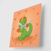 Cute Baby Dragon Holding Cup on Orange スクエア壁時計 (傾斜)