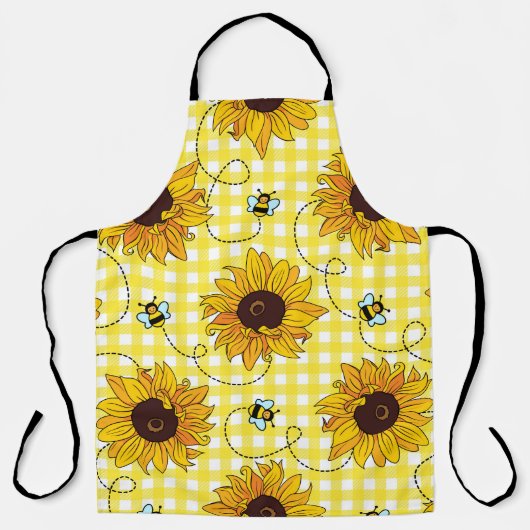 Cute bees and sunflowers on a checkered background エプロン (正面)