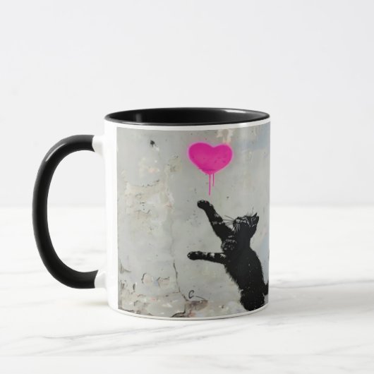Cute Black Cat Playing with A Pink Heart マグカップ (左)