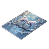 Cute budgies with bobble hats on a branch ノートブック (左側)