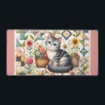 Cute Cat on Floral Quilt Cottagecore デスクマット<br><div class="desc">A delightful gray tabby kitten sits sweetly among blooming flowers in this cozy, cottagecore-inspired design. The backdrop features a vibrant patchwork quilt filled with charming geometric patterns, soft pastels, and vintage textures that evoke feelings of warmth and nostalgia. Surrounding the kitten are blooming sunflowers, roses, and daisies, along with cheerful...</div>