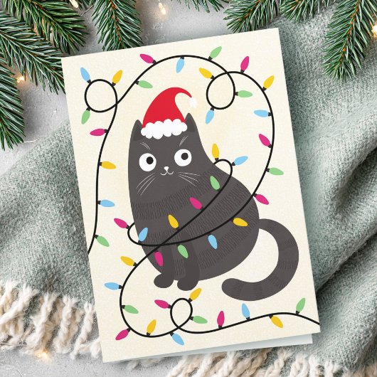 Cute cat with Santa hat and lights Christmas シーズンカード