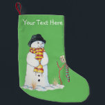 Cute christmas snowman in the snow patchwork スモールクリスマスストッキング<br><div class="desc">The cute snowman on this customizable shabby chic christmas stocking is looking very smart in his stripy scarf and his black hat. The happy snowman has a smile on his face as he looks down to his stripy Christmas stocking that he’s carefully hung on a tree branch that’s sticking out...</div>