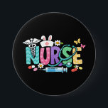 Cute Easter Nurse Medical Humor 缶バッジ<br><div class="desc">Colorful lettering with a nurse hat,  stethoscope,  flowers and playful medical symbols. A cheerful graphic celebrating caring nurses and healthcare professionals during the Easter season with a bright and friendly hospital atmosphere.</div>