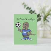 Cute funny Komodo dragon playing soccer cartoon ポストカード (スタンド正面)