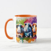 Cute guinea pigs with splashes of color マグカップ (左)