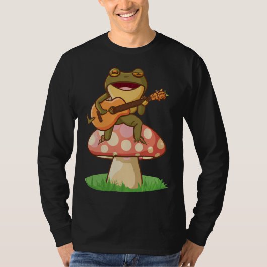 Cute Japanese frog playing guitar banjo on a mushr Tシャツ (正面)