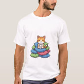 Cute Orange Tabby Cat Relaxing on Stack Tシャツ (正面)