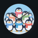 Cute Penguins Winter Scarves Group Hug ラウンド壁時計<br><div class="desc">Adorable gang of cheerful cartoon penguins wrapped in colorful cozy scarves, huddling together on a snowy blue background. Sweet, heartwarming and playful, this charming winter scene radiates joy and friendship.</div>