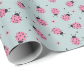Cute pink ladybugs Easter pattern on light blue ラッピングペーパー (ロールコーナー)