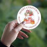 Cute Red Flowers Berries Gift Box Merry Christmas ラウンドシール<br><div class="desc">Cute Red Flowers Berries Gift Box Merry Christmas Classic Round Sticker . The sticker has a cute design with MERRY CHRISTMAS written in a pretty font with space to add family name. These cute stickers can be customized easily by changing the family name . For any further customization , feel...</div>