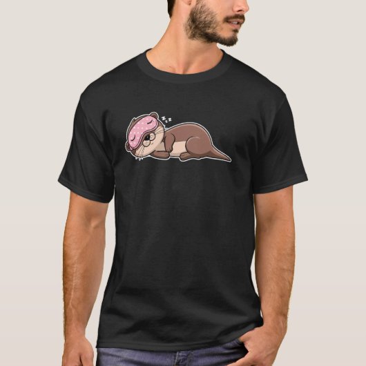 Cute Sleeping Otter with Pink Eye Mask Cartoon Des Tシャツ (正面)