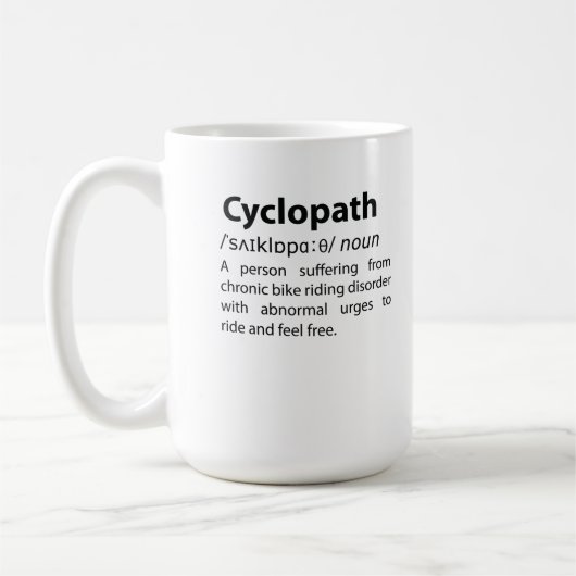 Cyclopathディクおもしろいショナリ定義 コーヒーマグカップ (左)