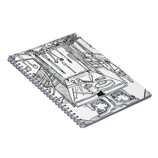 「Daからの手術台そして外科手術用の器具、 ノートブック (右側)