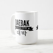 Daebakは韓国語で「すごい」を意味します コーヒーマグカップ (正面左)