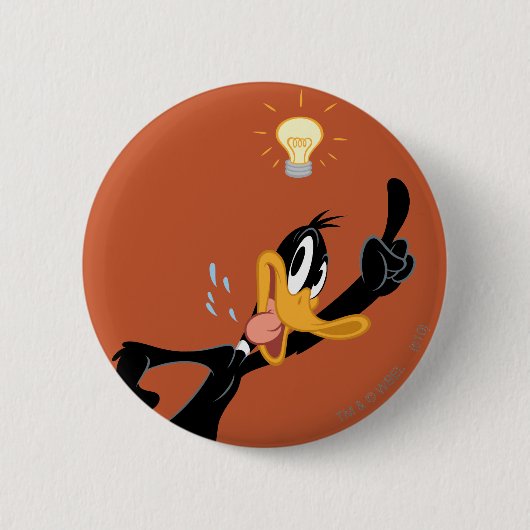 DAFFY DUCK™の頭の上に電球を置く 缶バッジ (正面)