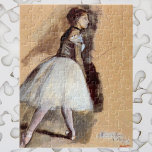 Dancer Standing by Edgar Degas, Vintage Ballet Art ジグソーパズル<br><div class="desc">Dancer Standing (1872) by Edgar Degas is a vintage impressionism fine art portrait painting featuring a ballerina leaning to one side pointing her toes. She is backstage warming up before a performance. About the artist: Edgar Degas (1834-1917) is regarded as one of the founders of Impressionism although he preferred realism...</div>