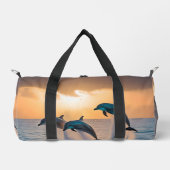 Dancing in the Dusk: Three Dolphins Leaping  ダッフルバッグ (正面)
