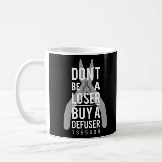 defuserを負け買なさい コーヒーマグカップ (左)