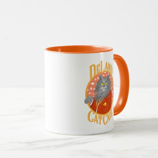 DeLand CatカフェのHenry DeCatオレンジのスーツのロゴ マグカップ (正面右)