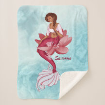 Desi pink mermaid sitting in a pink lotus flower
