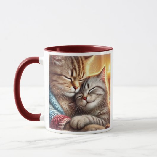 Deux chats blottis ensemble. マグカップ (左)