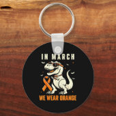 Dinosaur We Wear Orange Ribbon Multiple Sclerosis キーホルダー (正面)