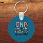 Dnp進行看護学生指導者Tシャツ キーホルダー (正面)