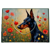 Doberman in a field of flowers  ラージペーパーバッグ (正面)