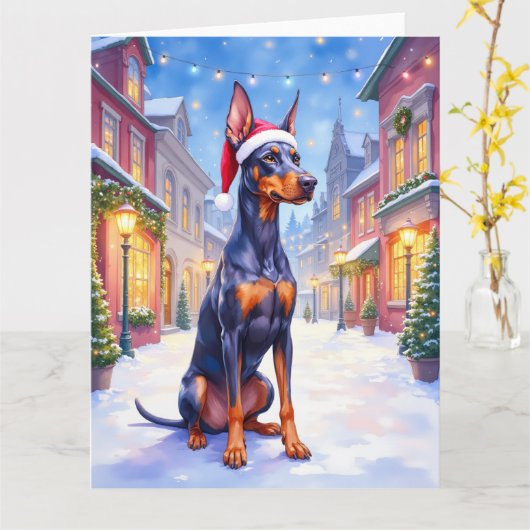 Doberman Pinscher Snowy Village Santa Hat Christma カード (黄色い花)