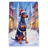 Doberman Pinscher Snowy Village Santa Hat Christma ミディアムペーパーバッグ (裏面)