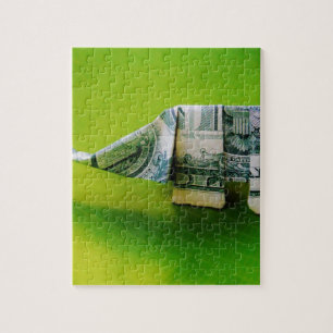 Dollar bill origami Elephant on Green background ジグソーパズル