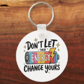 ⚡ Don’t Let Their Energy Change Yours キーホルダー (正面)