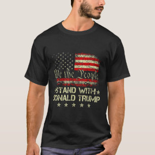 Donald Trump 2024のサポートで立つアメリカを取る Tシャツ