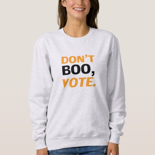 "Don't boo, vote"黒オレンジ色の白ハロウィーン スウェットシャツ (正面)
