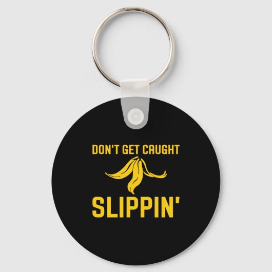 Dont Get Caught Slipng Funny Quote Banana Peel  キーホルダー (正面)