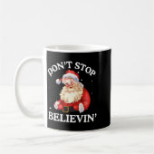 Don't Stop Believing Santa Funny Santa Claus Face  コーヒーマグカップ (左)