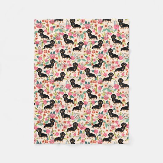 Doxieは-黒および黄褐色のダックスフント-クリームの一面をおおいます フリースブランケット (正面)