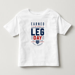 Earned Not Given レッグデイのジムモチベーションデザイン トドラーTシャツ