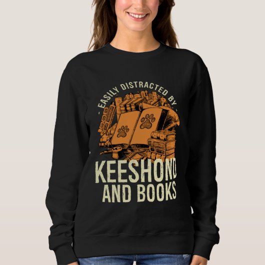 Easily Distracted By Keeshond And Books German Spi スウェットシャツ (正面)