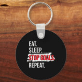 Eat Sleep Stop Goals Repeat - ホッケー選手 キーホルダー (正面)