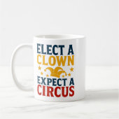 Elect A Clown Expect A Circus Fun コーヒーマグカップ (左)