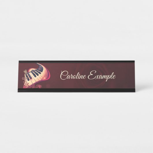 Elegance in motion, the curved piano. デスクネームプレート (正面)